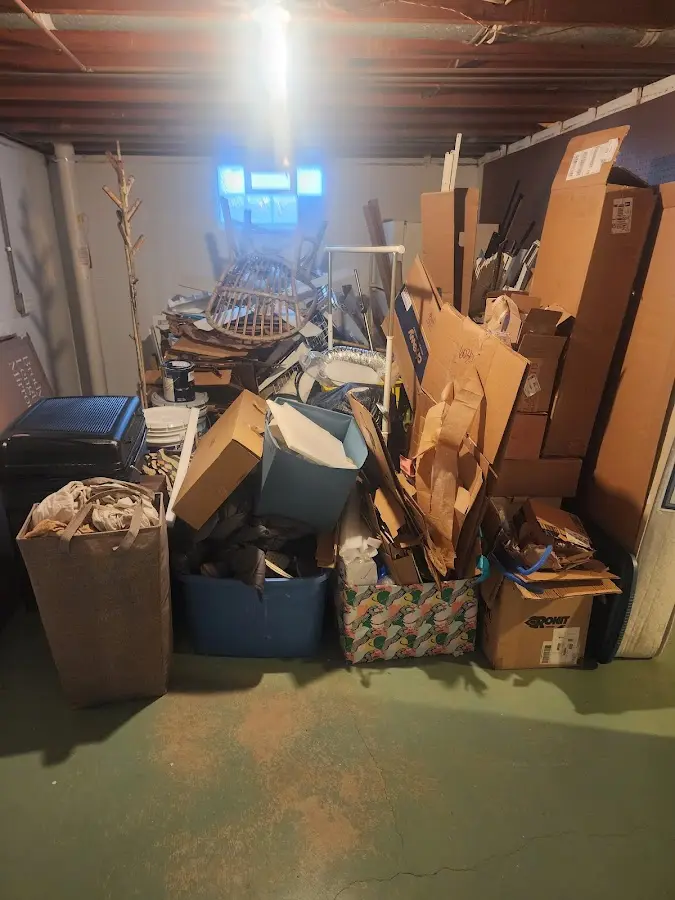 Roll-off dumpster container at job site for 2 Yard Dumpster Rental in Tysons